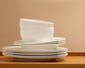 Wooden table top on defocused kitchen room and window background