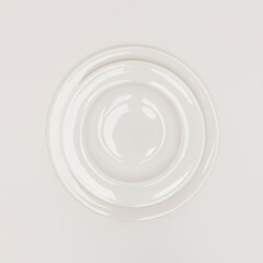 Empty white ceramic plate with brown rim on a light textured background, top view, copy space