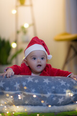 baby in santa claus hat