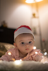 baby in santa claus hat