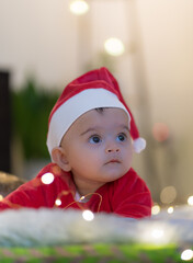 baby in santa claus hat