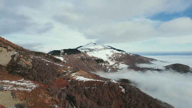 Panoramic view of Oasi Zegna during winter season with clouds