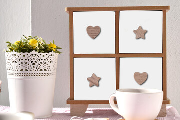 Photo for mock up image with white teacup, flower pot, decorative cupboard