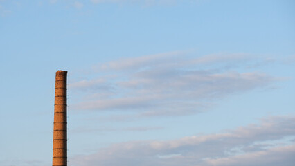 industrial brick chimney in front of sky, Germany, Berlin