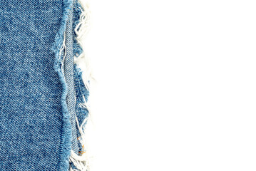 Frayed ripped jeans on a white background. Denim frame with empty space for inscription