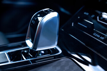 Close-up of automatic gearbox handle in the modern car