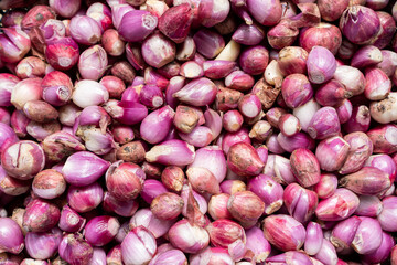 Closeup photo of peeled shallots