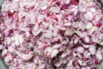 A bunch of sliced shallots in the close-up shot.