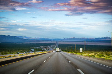 driving on the highway in nevada at dawn