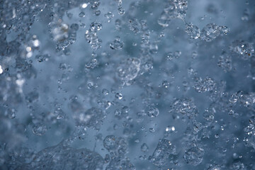 Water concept - river water flowing with light reflecting of its surface - long exposure shot