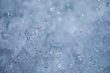 Water concept - river water flowing with light reflecting of its surface - long exposure shot