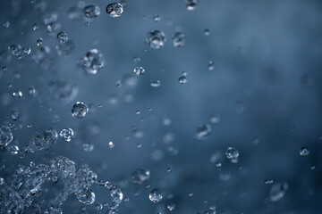 Water concept - river water flowing with light reflecting of its surface - long exposure shot
