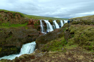 waterfall in the icelandic mountains