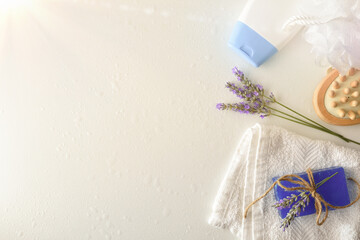Shower products with lavender extract on white table top view