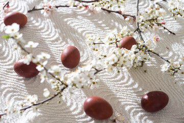 Colorful Easter eggs with spring blossom flowers. Colored Egg Holiday border. Easter cake