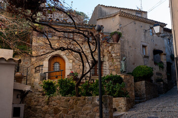 Mediterranean stone houses and wooden door