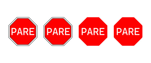 4 stop road signs in spanish on isolated white background