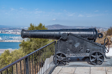 Military Heritage Centre of Gibraltar. Old historical cannon battery at the top of The Rock of Gibraltar. No people, beautiful sunshine, amazing blue sky above. UK                        