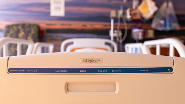 Portland, Oregon \ USA - February 24 2021:  Logo of a Stryker Medical company on a legplate of an empty hospital bed