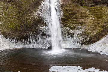 View at Horsetail Falls in Columbia River Gorge after winter snowfall.