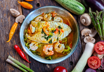 Moqueca, a traditional Brazilian dish with badejo fish and large shrimp, Badejo