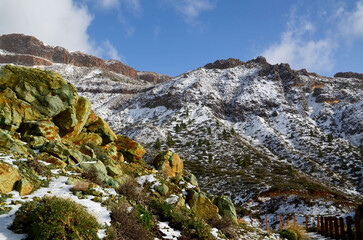 Winter in Teide National Park.View on snowy mountains near the Teide volcano,Tenerife,Canary Islands,Spain.Selective focus.