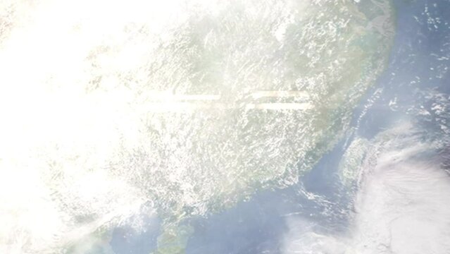 Earth zoom in from outer space to city. Zooming on Chenzhou, Hunan, China. The animation continues by zoom out through clouds and atmosphere into space. Images from NASA