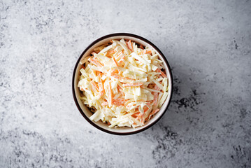 Coleslaw, cabbage carrot salad with greek yogurt dressing in a bowl