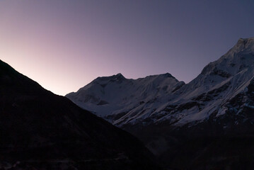 Vibrant silhouette sunrise in the Annapurna mountain range, Nepal