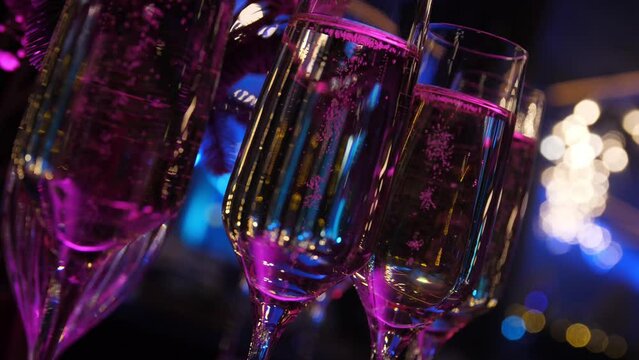 bubbles rise in champagne glasses. club atmosphere