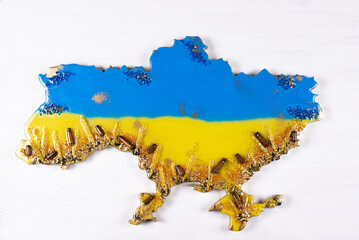 Ukraine on a white background. Flag and contours of Ukraine. Yellow Blue