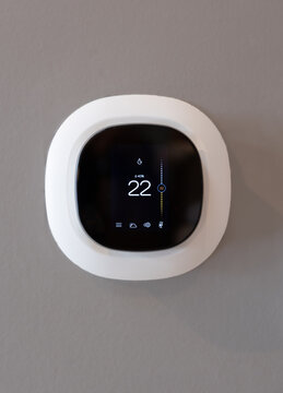 Thermostat moderne r&eacute;gl&eacute; &agrave; 22 Celcius