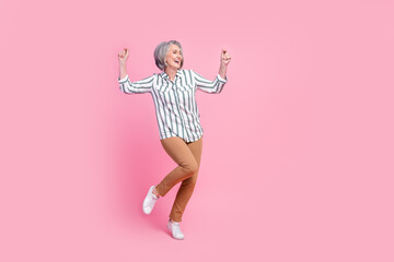 Full length photo of sweet pretty lady wear smart casual clothes having fun dancing empty space...