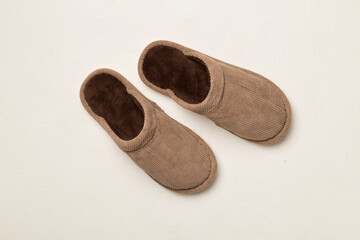 Man's slippers on wooden background, top view
