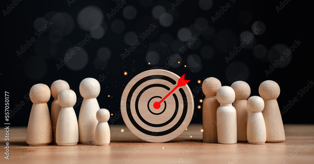 Poster target and goal concept, Wooden figures standing around dartboard and arrow for creative and set up business objective target goal, marketing solution, target for business investment.