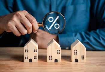 Property interest research best rate, Man selected house finance loan increase.investment...