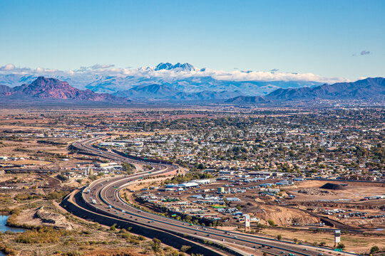 East Valley Mesa, Arizona Aerial with Four Peaks and clouds