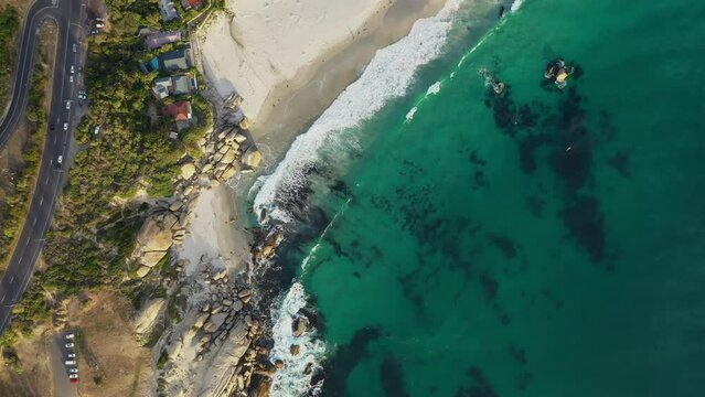 wealthy area aerial top shot over Hout Bay beach 