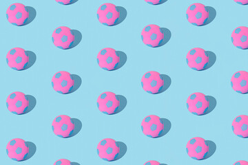 Spring or summer holiday. Creative pattern of balls on blue background. Concept of sport, fitness, recreation, game. Sporty lifestyle.