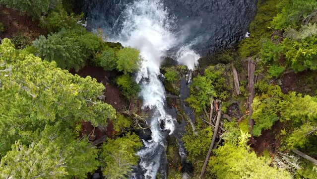 Aerial shot of the amazing Koosah Falls and lush moss covered forest on the McKenzie River in Oregon.
