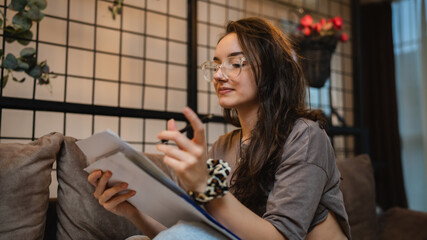 One woman young caucasian female student study and read at home