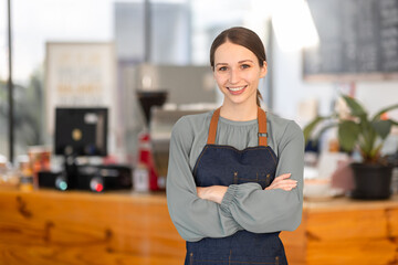 Open small business, Happy america, canada, woman in an apron standing near a bar counter coffee...