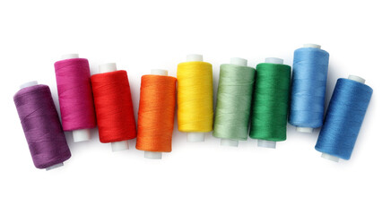 Set of different colorful sewing threads on white background, top view