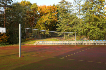 View of volleyball court with net outdoors
