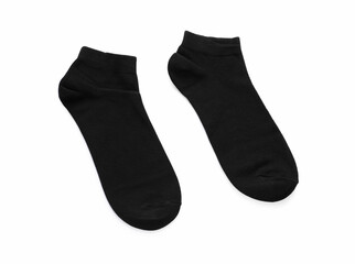 Pair of black socks on white background, top view