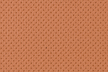 Perforated brown leather texture