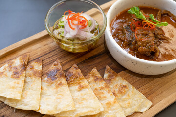 Beef Curry and Roti. beef, Thai food, placed on the table in the restaurant.