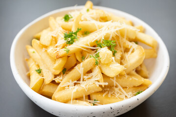 French fries. potato chips. Bowl with fresh cooked french fries potato chips. appetizing. copy space for text.