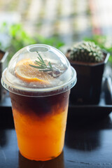 Glass of americano mixed with orange juice