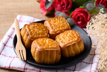 Obraz na płótnie Canvas Chinese moon cake, traditional dessert celebrating in Chinese festival mid autumn or new year